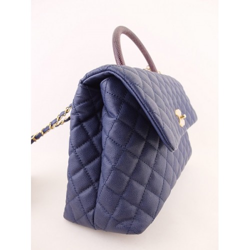 chanel caviar flap bag with top handle
